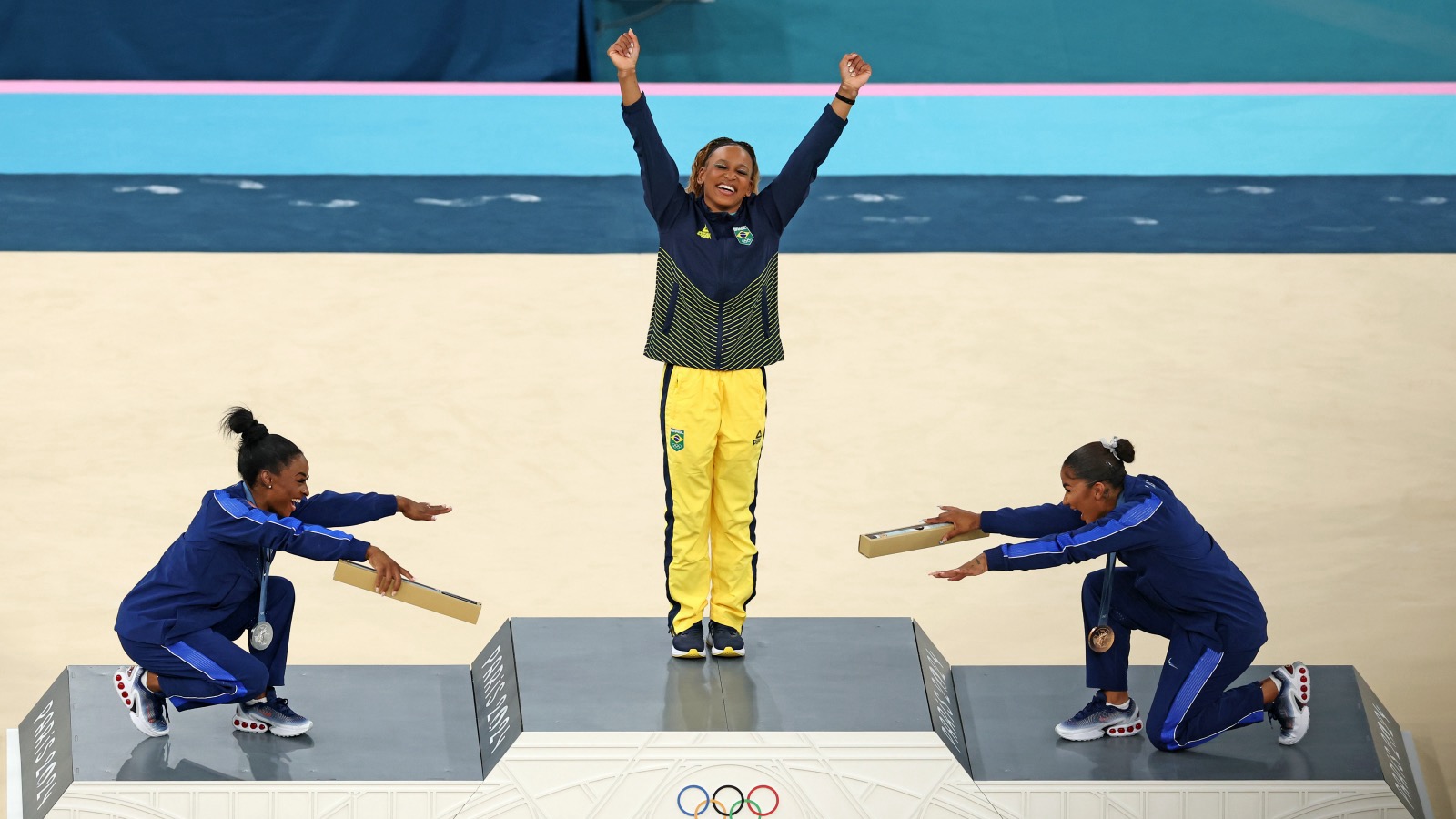 Simone Biles And Jordan Chiles Bow Down To Rebeca Andrade