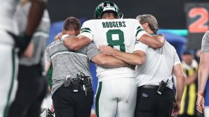 aaron rodgers being carried off the field