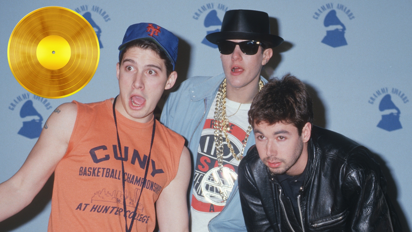 The Beastie Boys looking at RIAA gold record