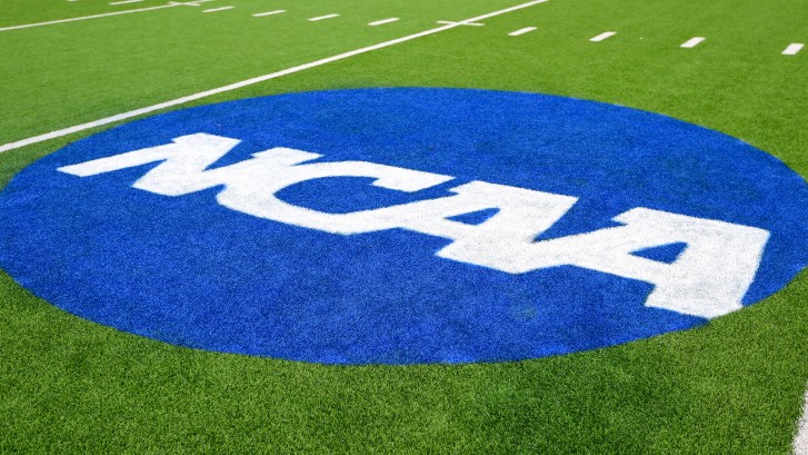 NCAA logo on football field