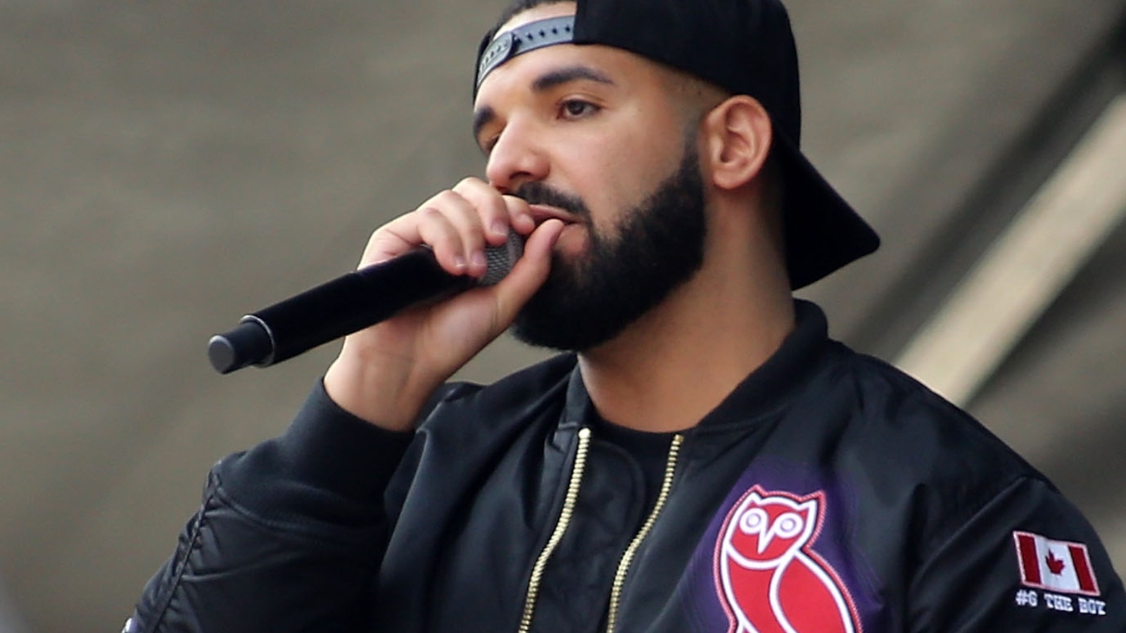 Rapper Drake wearing OVO jacket