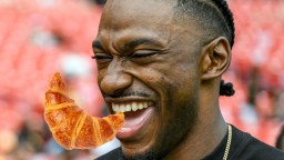 RGIII Getting Roasted For Posting Strange Pic Of He And His Wife Shoving A Croissant Down His Throat