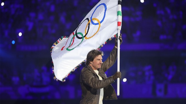 Tom Cruise holding Olympic flag