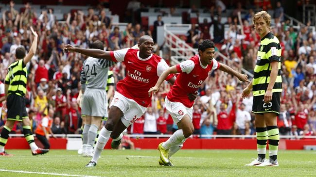 Arsenal's Carlos Vela celebrates scoring his sides first goal of the game with teammate Jay Emmanuel-Thomas