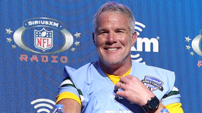 Brett Favre and SiriusXM host Brady Quinn speak onstage