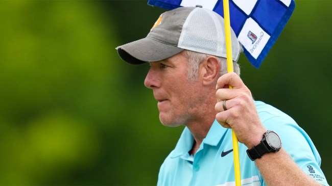 Brett Favre holds flag during American Family Insurance Championship