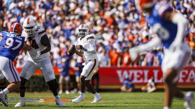 Miami QB Cam Ward drops back to pass vs. Florida.