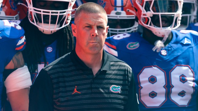 Florida Gators head coach Billy Napier waits to take the field