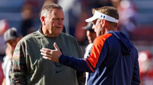 Arkansas coach Sam Pittman and Auburn coach Hugh Freeze