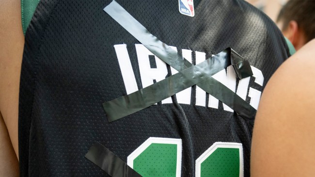 Kyrie Irving Boston Celtics jersey altered with tape