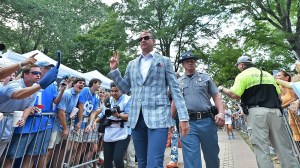 Ole Miss head coach Lane Kiffin walks to the stadium.