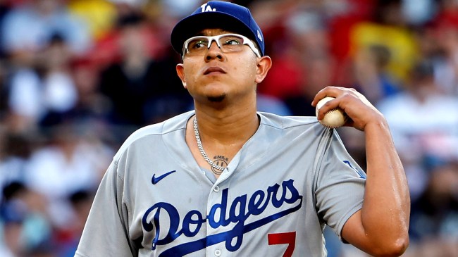 Pitcher Julio Urias 7 of the Los Angeles Dodgers stands on the mound