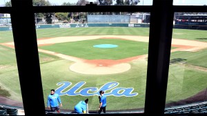 Staff from UCLA clear out baseball equipment from Jackie Robinson Stadium