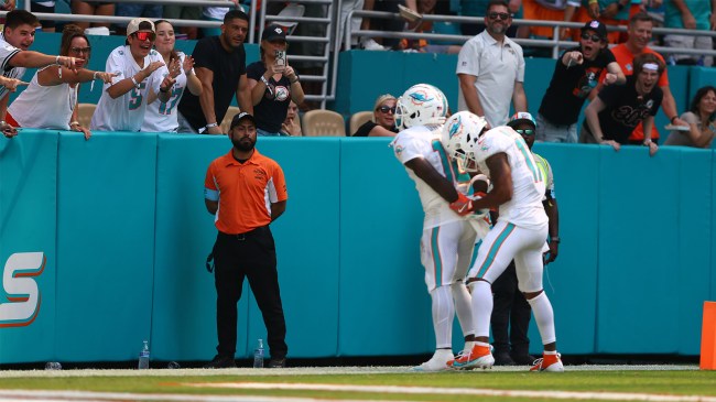 Tyreek Hill of the Miami Dolphins and Jaylen Waddle celebrate after touchdown