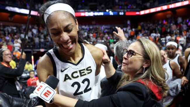 A'ja Wilson and Becky Hammon speak during a postgame interview.