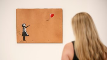 2 Charged With Stealing Banksy’s Iconic ‘Girl With Balloon’ From Gallery In A Crime That Feels Like A Stunt