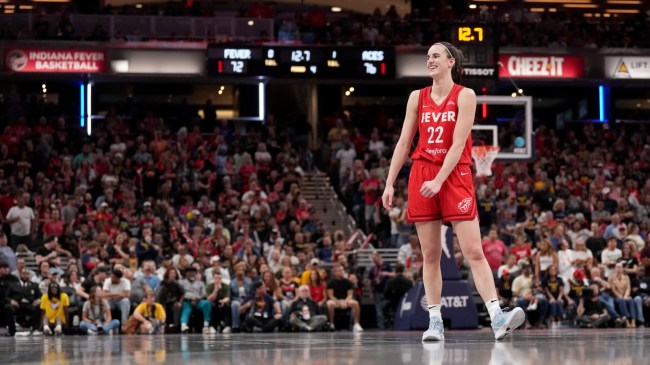 Indiana Fever guard Caitlin Clark reacts to a call from a referee.