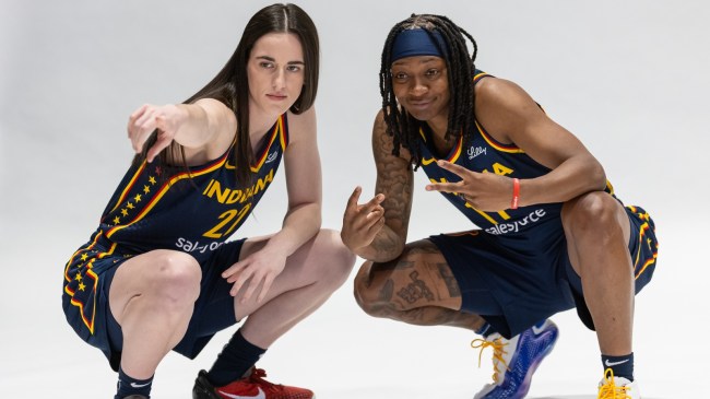 Indiana Fever teammates Erica Wheeler and Caitlin Clark pose for a photo.