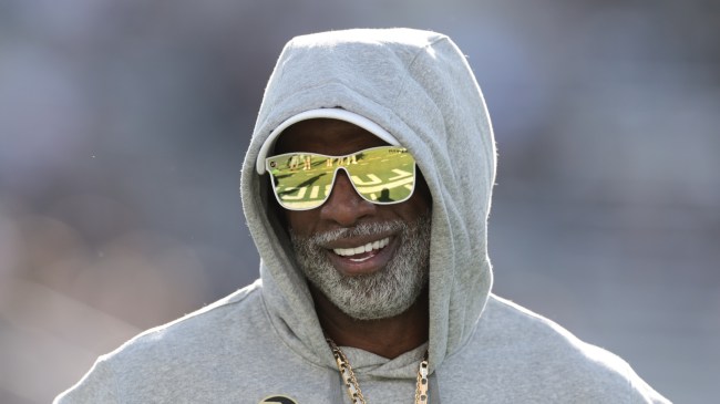 Deion Sanders on the field before a game between Colorado and Colorado State.