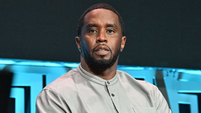 diddy in a grey outfit