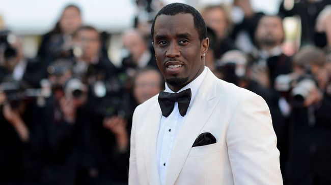 diddy in a white tux at cannes