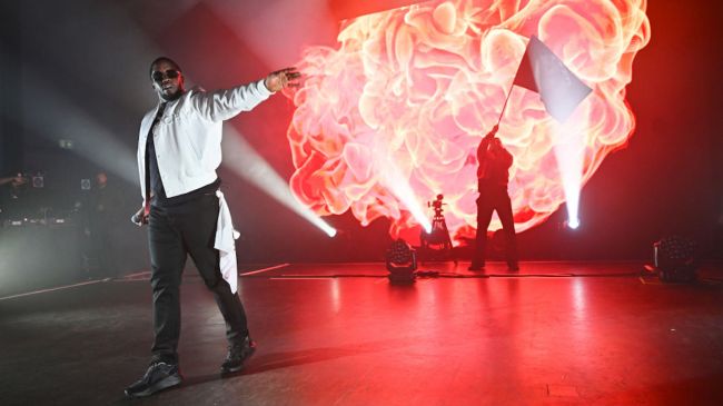 diddy performing in front of fire