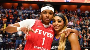 DiJonai Carrington and NaLyssa Smith pose for a photo during the WNBA playoffs.