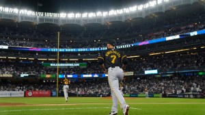 Isiah Kiner-Falefa runs onto the field for the Pittsburgh Pirates.