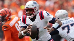 New England Patriots QB Jacoby Brissett scrambles against the Cincinnati Bengals.