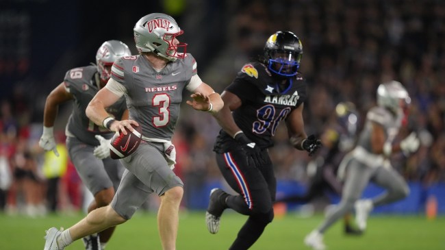 UNLV QB Matthew Sluka scrambles during a game vs. Kansas.