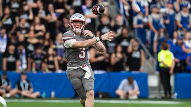 UNLV QB Matthew Sluka throws a pass vs. Kansas.
