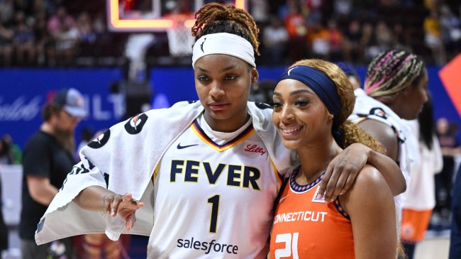 NaLyssa Smith and Dijonai Carrington pose for a photo.