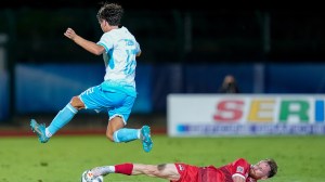 San Marino soccer player jumps over tackle