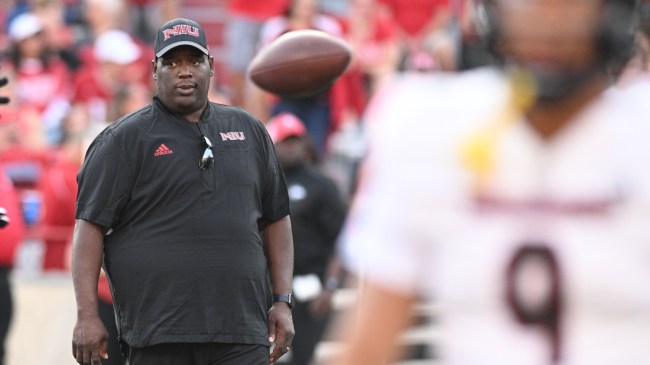 Northern Illinois coach Thomas Hammock on the field before a game.