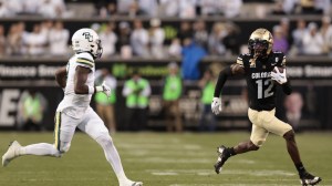 Colorado's Travis Hunter runs the ball during a game vs. Baylor.