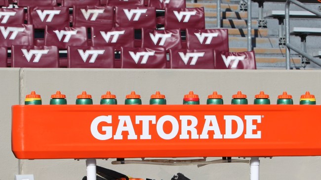 Virginia Tech logos on empty seats in Lane Stadium.