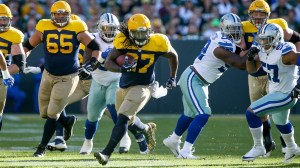 Eddie Lacy 27 of the Green Bay Packers runs the ball against Dallas Cowboys