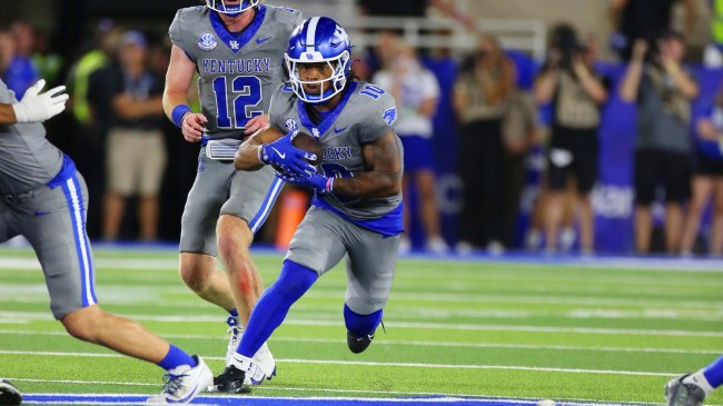 Kentucky football player Jamarion Wilcox runs the ball vs. Georgia.