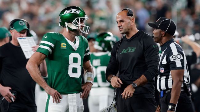 aaron rodgers and robert saleh on the sidelines