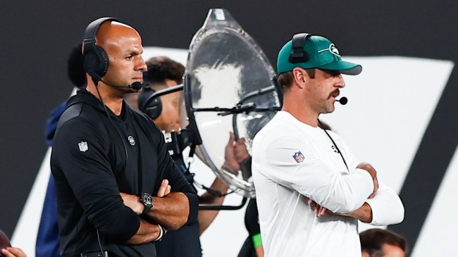 Aaron Rodgers and Robert Salah on the New York Jets sideline.