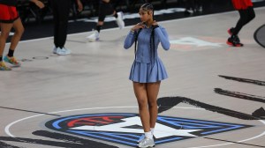 Chicago Sky forward Angel Reese on the floor before a game.