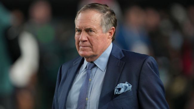 bill belichick in a blue suit