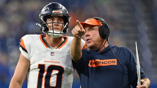 Denver Broncos QB Bo Nix and HC Sean Payton chat on the sidelines.