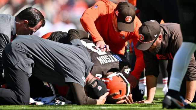 deshaun watson with his head in his hands after an injury