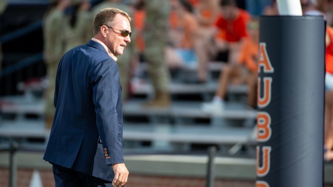 Auburn football coach Hugh Freeze on the field before a game.