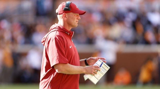 Alabama football coach Kalen DeBoer on the field.