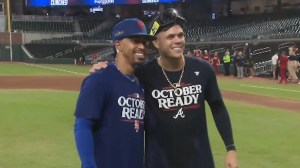 mets and brave players celebrating postseason together