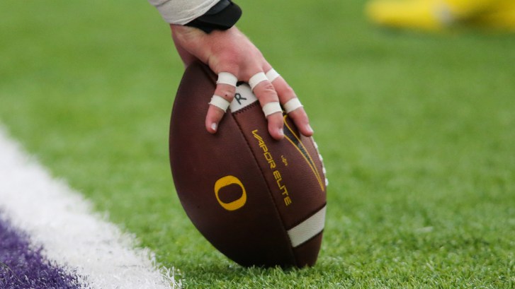 Oregon Ducks logo on football