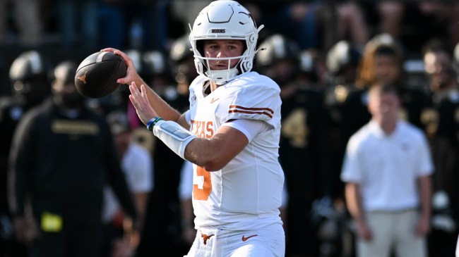 Texas QB Quinn Ewers drops back to pass during a football game vs. Vanderbilt.
