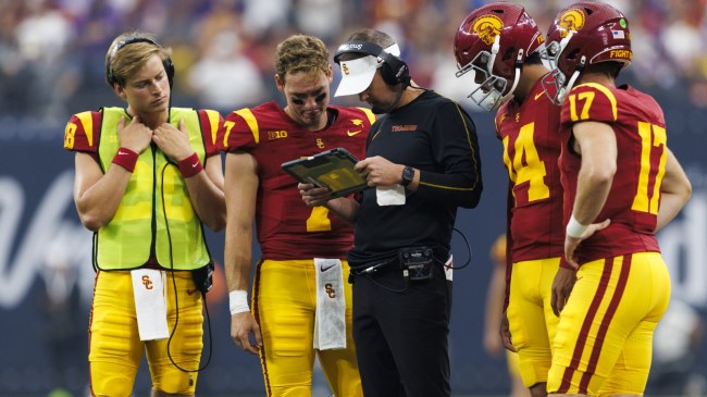 USC football coach Lincoln Riley speaks to his quarterbacks.